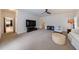 Spacious living room with carpet and large television for modern comfort at 5 Coventry Close, Avondale Estates, GA 30002