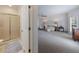Spacious main bedroom includes an en suite bathroom with sliding glass shower at 5 Coventry Close, Avondale Estates, GA 30002