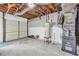 Unfinished basement area featuring white walls and exposed ceiling with ductwork at 279 Alex St, Canton, GA 30114