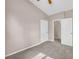 Bedroom with neutral walls, carpeted floors and two entry doors at 279 Alex St, Canton, GA 30114