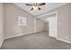 Comfortable bedroom featuring vaulted ceilings, fan, neutral walls, carpeted floors and natural light at 279 Alex St, Canton, GA 30114