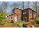 Delightful two-story home showcasing a well-manicured lawn and inviting entrance at 279 Alex St, Canton, GA 30114