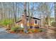 Charming home nestled in a wooded area, featuring a distinctive facade at 279 Alex St, Canton, GA 30114