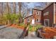 Stylish home featuring a welcoming entryway, lush lawn, and unique architecture at 279 Alex St, Canton, GA 30114