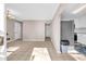 Sunlit living room boasting tile floors, neutral walls, and views to kitchen and entry at 279 Alex St, Canton, GA 30114