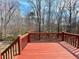 View of spacious back deck with views of the wooded scenery at 3520 Newberry Ln, Douglasville, GA 30135