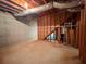 Unfinished basement with concrete walls at 3520 Newberry Ln, Douglasville, GA 30135