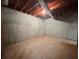 Unfinished basement with concrete walls and floor, showing potential for storage at 3520 Newberry Ln, Douglasville, GA 30135