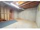 Unfinished basement with concrete walls and ceiling, perfect for storage or renovation at 3520 Newberry Ln, Douglasville, GA 30135