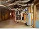 Basement with utility systems including HVAC and water heater at 3520 Newberry Ln, Douglasville, GA 30135