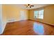 Bedroom featuring hardwood floors, a window, and neutral walls at 3520 Newberry Ln, Douglasville, GA 30135