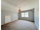 Spacious bedroom featuring neutral walls, carpet flooring, and a large window for natural light at 3520 Newberry Ln, Douglasville, GA 30135