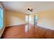 Bedroom with hardwood floors, ceiling fan, and a window at 3520 Newberry Ln, Douglasville, GA 30135