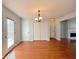 Bright dining area with hardwood floors, offering a seamless transition to the outdoors at 3520 Newberry Ln, Douglasville, GA 30135