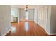 Cozy dining area featuring hardwood floors and access to the backyard through a glass door at 3520 Newberry Ln, Douglasville, GA 30135