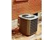 Close-up of the air conditioning unit outside the brick home, illustrating outdoor detail at 2143 Rhinehill Se Rd, Atlanta, GA 30315