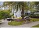 Community grilling and fire pit area at 44 Peachtree Nw Pl # 1328, Atlanta, GA 30309