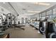 Spacious fitness center with treadmills and weight-lifting equipment at 44 Peachtree Nw Pl # 1328, Atlanta, GA 30309
