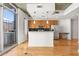 Contemporary kitchen with stainless steel appliances, island counter, and city view at 44 Peachtree Nw Pl # 1328, Atlanta, GA 30309