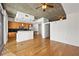 Bright open living area featuring hardwood floors and modern kitchen with stainless steel appliances at 44 Peachtree Nw Pl # 1328, Atlanta, GA 30309