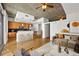 Bright living room featuring a modern kitchen, hardwood floors, and comfortable seating area with modern decor at 44 Peachtree Nw Pl # 1328, Atlanta, GA 30309