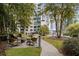 Relaxing outdoor seating areas with lush landscaping at 44 Peachtree Nw Pl # 1328, Atlanta, GA 30309