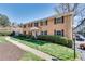 Brick apartment building featuring well-maintained landscaping, visible walkway and parking at 3510 Nw Roswell Nw Rd # J1, Atlanta, GA 30305