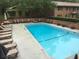 Sparkling community pool with lounge chairs for residents' enjoyment at 3510 Nw Roswell Nw Rd # J1, Atlanta, GA 30305