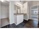 Modern bathroom featuring a double vanity, and access to both the bedroom and a walk-in closet at 7006 Mahonia Pl, Lithonia, GA 30038