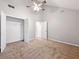 Bedroom with neutral carpet, vaulted ceiling and ceiling fan at 7006 Mahonia Pl, Lithonia, GA 30038