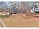 A charming two-story house with a lovely front yard is shown in an aerial view at 5073 Hyacinth Ln, Austell, GA 30106