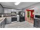 This kitchen boasts ample counter space, modern appliances, and adjacent dining area at 5073 Hyacinth Ln, Austell, GA 30106