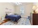 Charming bedroom featuring hardwood floors, a ceiling fan, and a matching dresser at 7640 Harbour Walk, Cumming, GA 30041