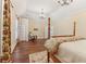 Bright bedroom with hardwood floors, chandelier, and natural light at 7640 Harbour Walk, Cumming, GA 30041