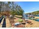 Relax and unwind on this expansive dock with comfortable seating and stunning views of the lake at 7640 Harbour Walk, Cumming, GA 30041