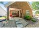 Backyard with a patio area with tables and chairs at 1152 Strath Clyde Way, Mcdonough, GA 30253