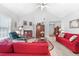 Bright living room with vaulted ceilings, large windows, and a cozy fireplace, providing a warm and inviting space at 1152 Strath Clyde Way, Mcdonough, GA 30253