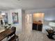 Inviting hallway with a wet bar and recessed lighting at 1644 Alexandria Ct, Marietta, GA 30067