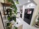 Bright kitchen with white subway tiles, open shelving, and a black refrigerator at 1644 Alexandria Ct, Marietta, GA 30067