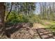 An ornate gazebo sits in the shade of a backyard at 1767 Wingard Dr, Marietta, GA 30062