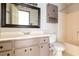 Bathroom with vanity, mirror, toilet, and tub at 1767 Wingard Dr, Marietta, GA 30062