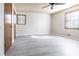 Bedroom featuring hard flooring, two large windows, and two closets at 1767 Wingard Dr, Marietta, GA 30062