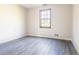 Bright bedroom featuring a large window and neutral walls at 1767 Wingard Dr, Marietta, GA 30062