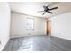 Bedroom with hard flooring, a ceiling fan, and a window at 1767 Wingard Dr, Marietta, GA 30062