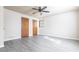 Bedroom with hard flooring, two closets, and a window at 1767 Wingard Dr, Marietta, GA 30062