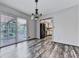 Dining area features sliding glass doors to the backyard and seamless flow into the kitchen at 1767 Wingard Dr, Marietta, GA 30062