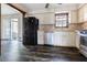 Charming kitchen with stainless steel appliances and dark wood-look flooring at 1767 Wingard Dr, Marietta, GA 30062