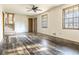 Spacious living room with wood-look floors, ceiling fan, and natural light, perfect for relaxation and entertainment at 1767 Wingard Dr, Marietta, GA 30062