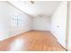 Large living room with hardwood floors, lots of light, and a ceiling fan at 1767 Wingard Dr, Marietta, GA 30062