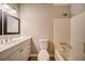 Full bathroom with vanity, toilet, and tub shower combo with tile surround at 3260 Sims View Ct, Snellville, GA 30078